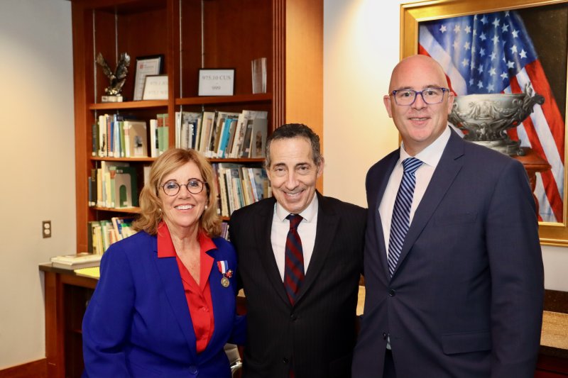 Amy Marasco, Lewes mayor, and Sen. Russ Huxtable, D-Lewes, flank Rep. Jamie Raskin in the Delaware Room. Shown are (l-r) Marasco, Raskin and Huxtable.